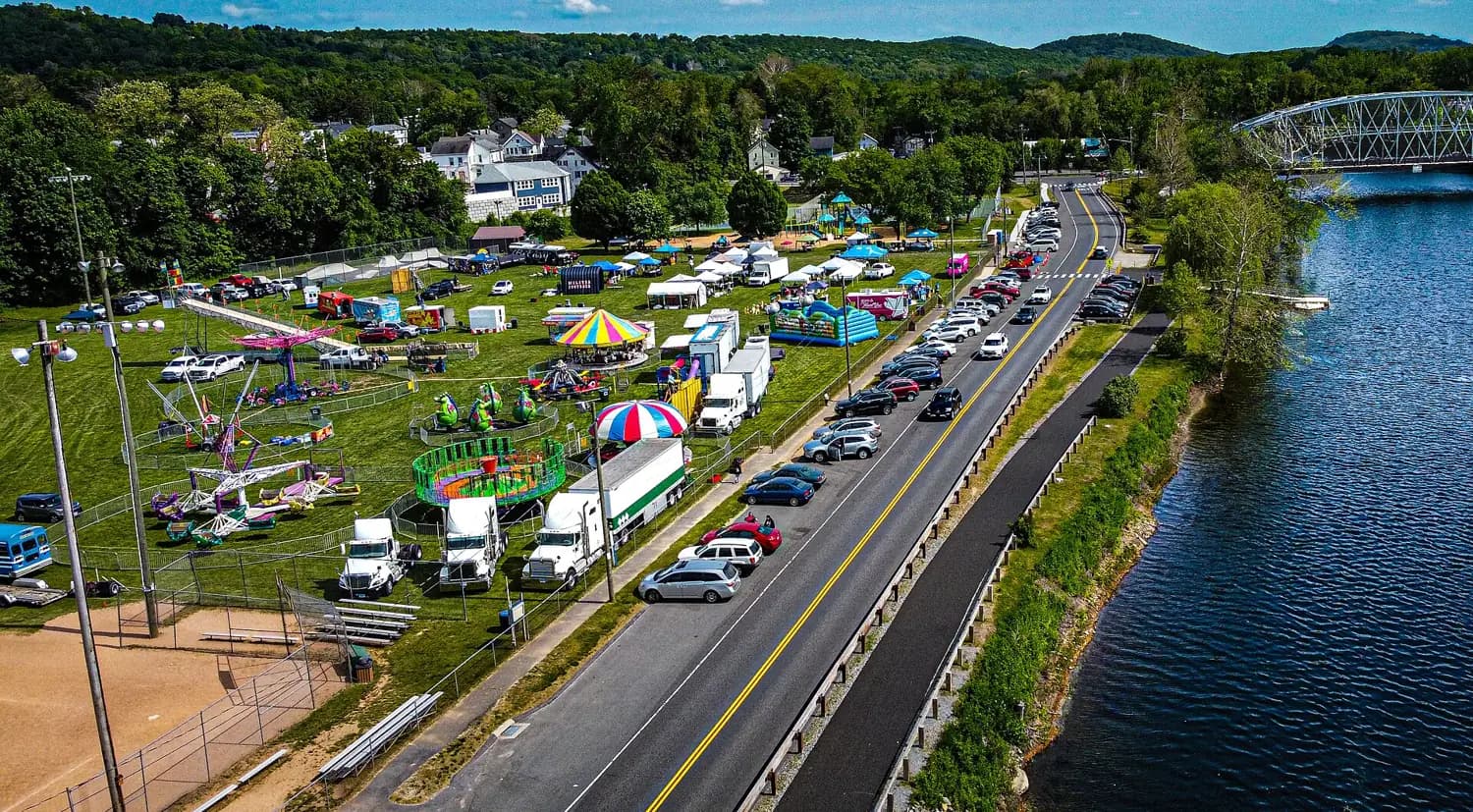 Aerial view of New Milford, Connecticut during the G.O.A.T. Days carnival beside the Housatonic River